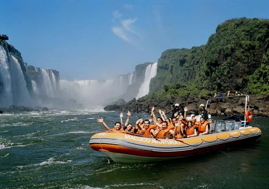 Adventure at Iguazu Falls: Safari, Bird Park, and Waterfalls - Taking the Macuco Safari boat toward the falls