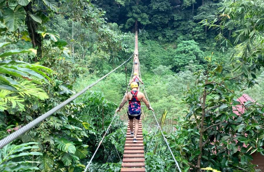 Phuket: White Water Rafting, Zipline, and Elephant Sanctuary - Crossing the Skywalk before the river