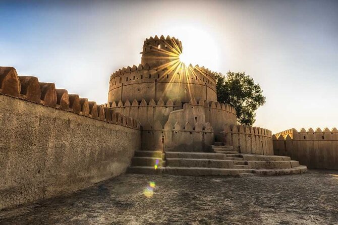 Private Garden City Tour with Zoo Ticket at Al Ain - Reading Al Jahili Fort through its mud-brick walls