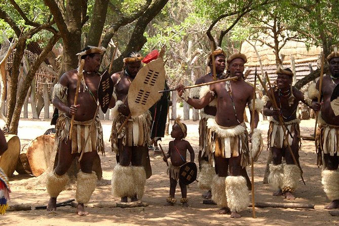Private Guided Cultural Day Tour of Zulu Village & PheZulu Safari Park - Entering the Recreated Zulu Village