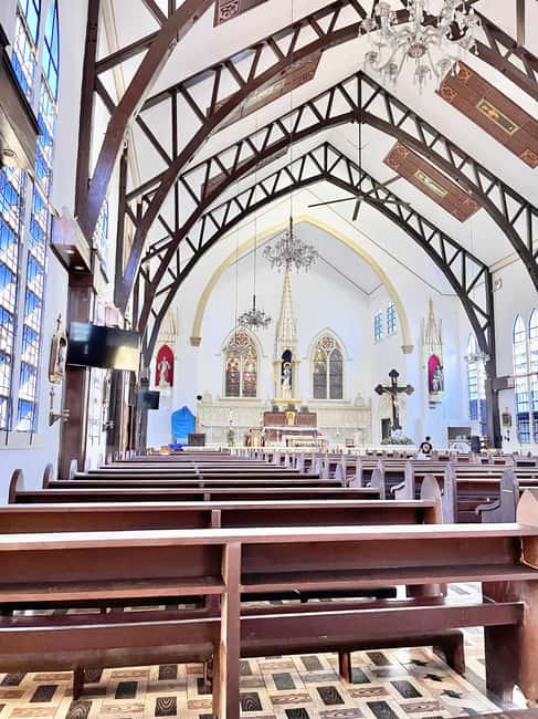 Puerto Princesa: Half Day City Tour with Butterfly Garden - Plaza Cuartel, a quiet World War II memorial