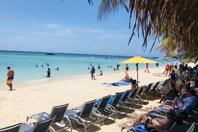 West Bay Beach Break / Monkey and Sloth Sanctuary - The final Roatan sign and island views